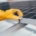 Gloved hand adjusting bolt on a solar panel.